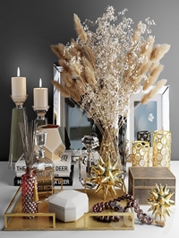 Decorative set with a bouquet of white flowers and dry grass