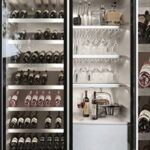 Wine cabinet with wine and crystal service. Alcohol