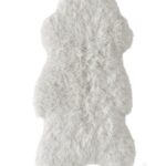 White fluffy sheepskin carpet