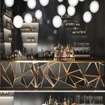 A bar counter with a beautiful backlight and a collection of alcohol. Restaurant