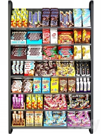 Shelf in the supermarket with sweets. Chocolate