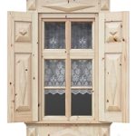 Wooden window with shutters and architraves