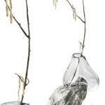Branch with earrings in a sculpture vase by Laetitia Jacquetton